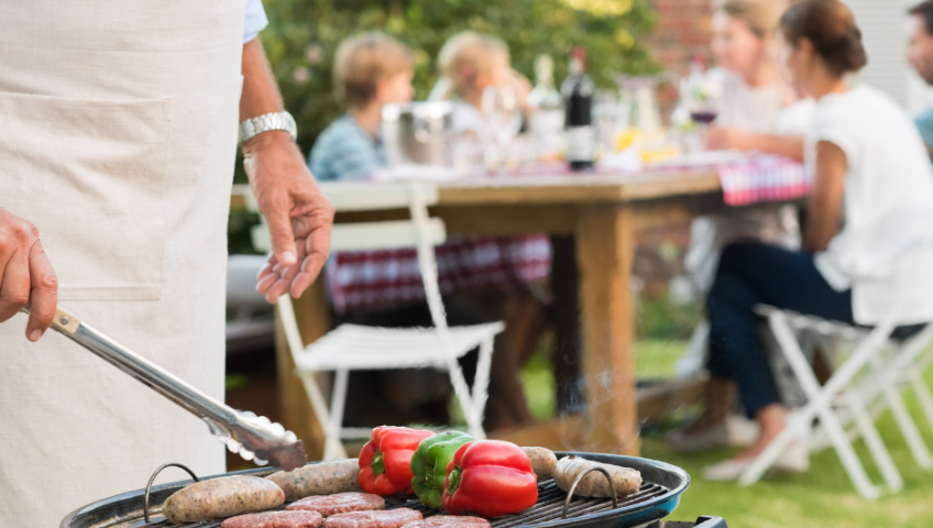 family enjoying bbq outside because of mosquito treatments